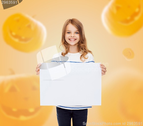 Image of smiling little girl with white board