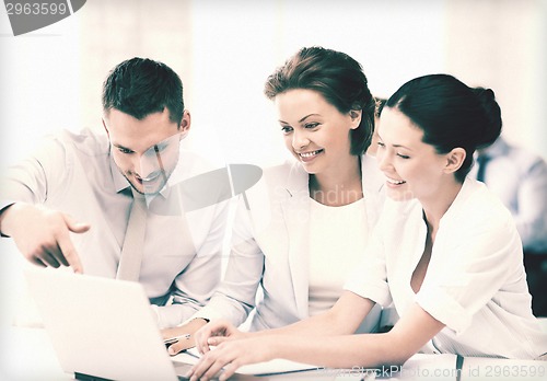 Image of business team having discussion in office