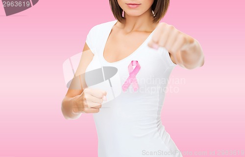 Image of close up young woman with cancer awareness ribbon