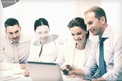 Image of business team having discussion in office