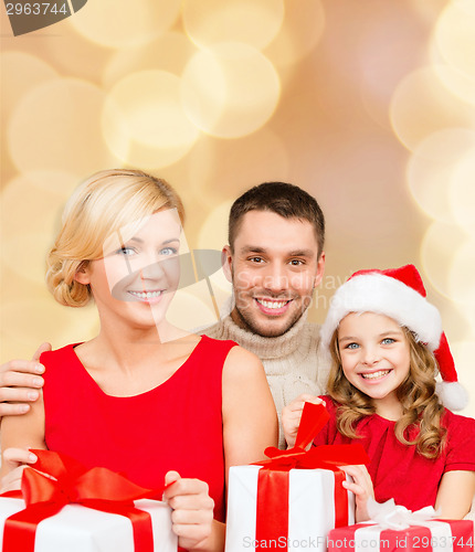 Image of happy family with gift boxes