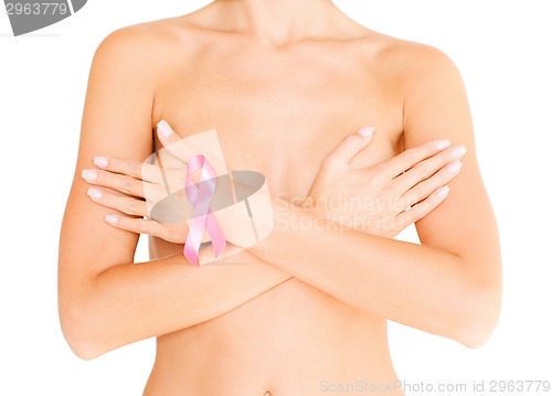 Image of naked woman with breast cancer awareness ribbon
