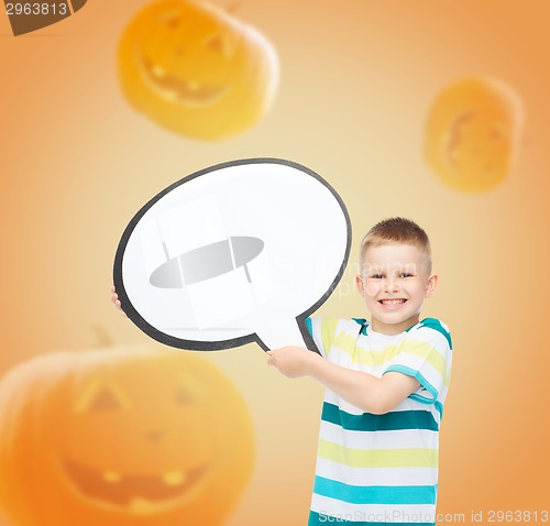 Image of smiling little boy holding big white text bubble