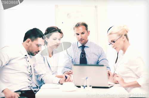 Image of business team having meeting in office