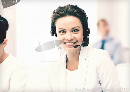 Image of friendly female helpline operator