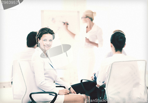 Image of businesswoman on business meeting in office