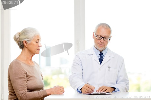 Image of senior woman and doctor meeting