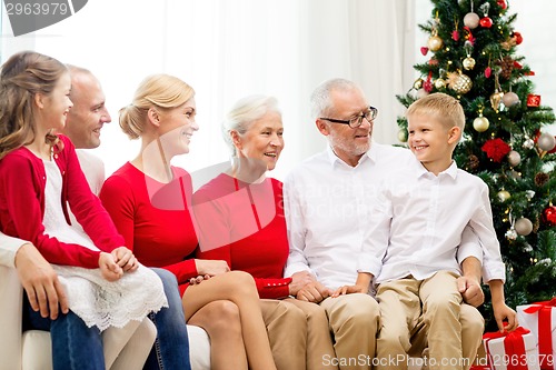 Image of smiling family at home