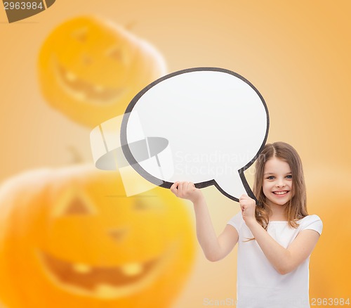 Image of smiling little girl holding big white text bubble