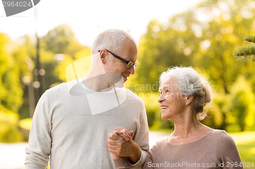 Image of senior couple in city park