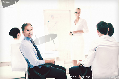 Image of businessman on business meeting in office