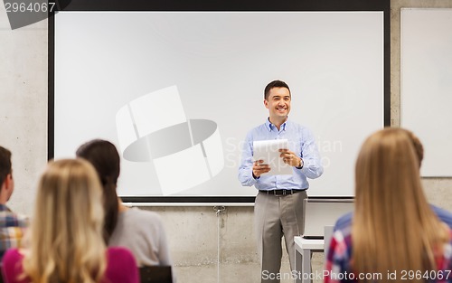 Image of group of students and teacher with notepad