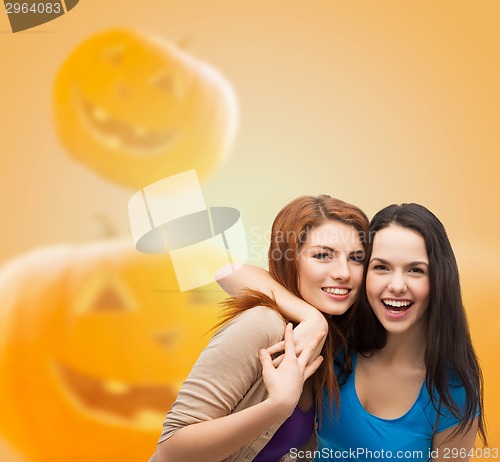 Image of smiling teenage girls in casual clothes