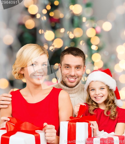 Image of happy family with gift boxes