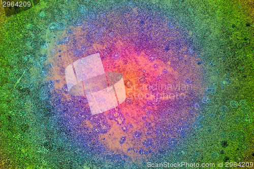 Image of rusty, painted  tin