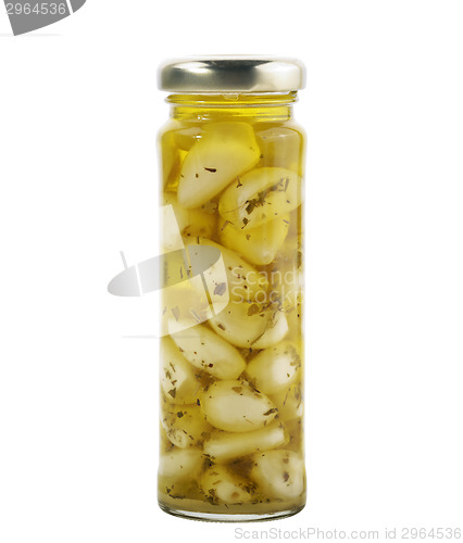 Image of Glass Jar Of Garlic With Olive Oil