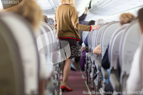 Image of Stewardess on the airplane.