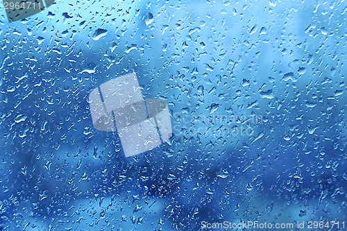 Image of Natural water drops on window glass