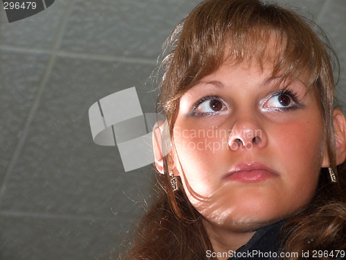 Image of Portrait of the young beautiful girl looking sideways