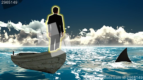 Image of Businessman on boat & shark