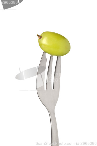 Image of Green grape held by a fork