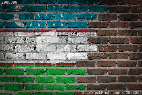 Image of Brick wall texture with flag