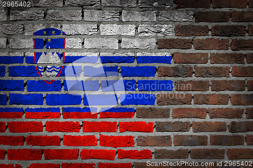 Image of Brick wall texture with flag