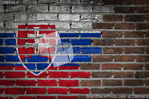 Image of Brick wall texture with flag