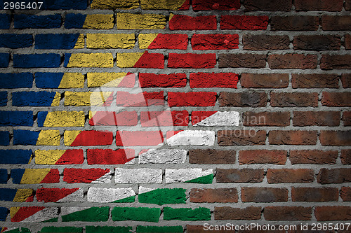 Image of Brick wall texture with flag