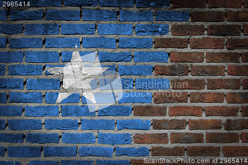 Image of Brick wall texture with flag