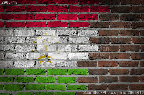 Image of Brick wall texture with flag