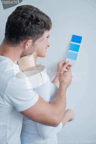 Image of Caucasian Couple Looking at Color Indicator Paper