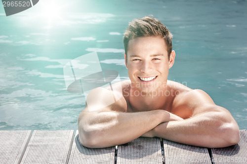 Image of man at the pool