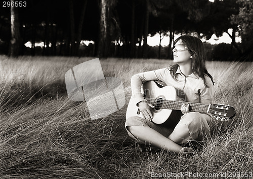 Image of Playing guitar