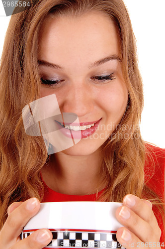 Image of Woman with bowl of sup.