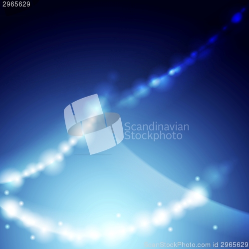 Image of Shiny blue wavy vector background