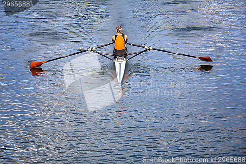 Image of Woman in a boat