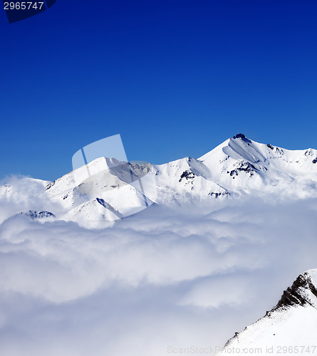 Image of Mountains in clouds at nice day