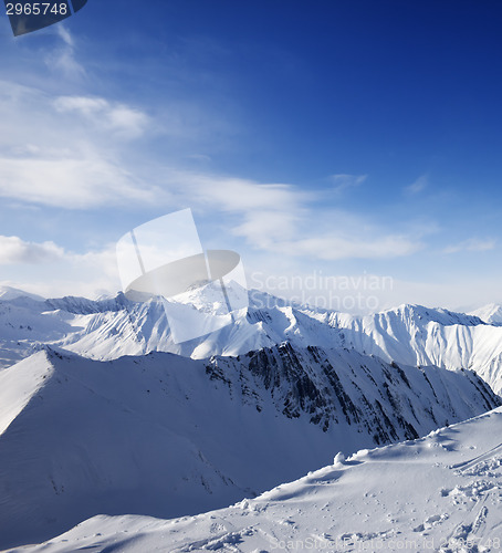 Image of Snowy mountains at sun day