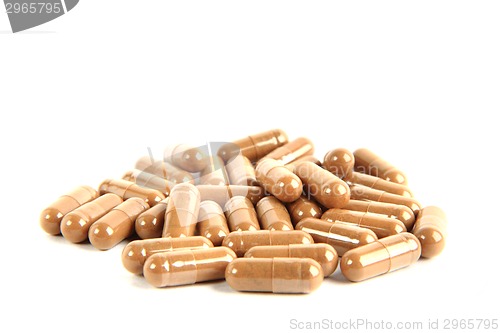 Image of brown pills isolated