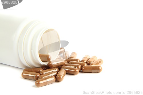 Image of brown pills isolated
