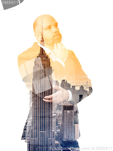 Image of business man double exposure building
