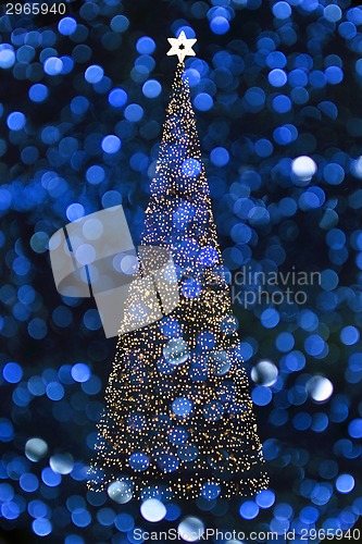 Image of christmas tree with blue background