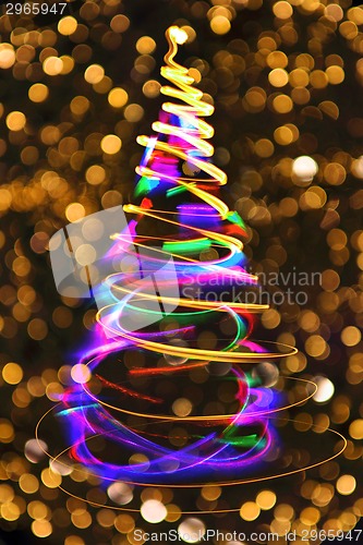 Image of christmas tree with golden background