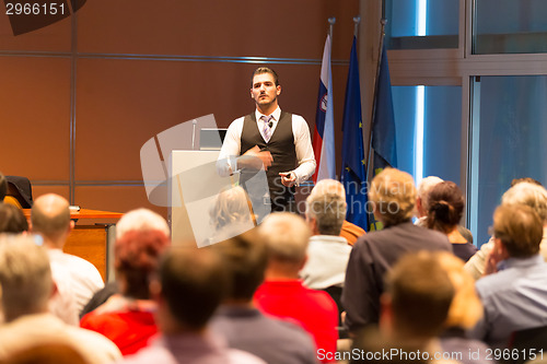 Image of Speaker at Business Conference and Presentation.