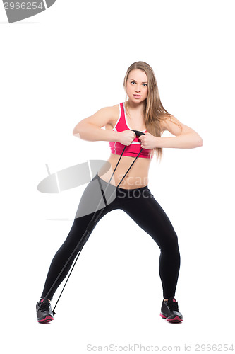 Image of Sporty woman doing exercises