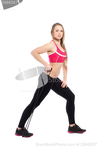 Image of Pretty woman doing exercises