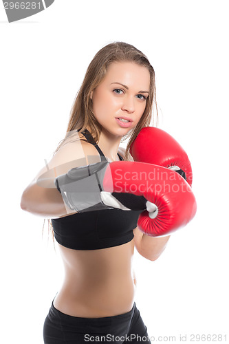 Image of Pretty woman posing with boxing gloves