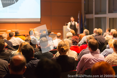 Image of Speaker at Business Conference and Presentation.