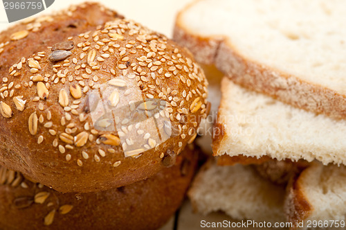 Image of organic bread over rustic table